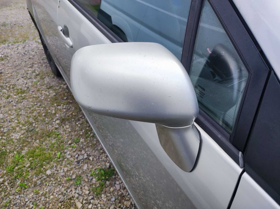 Lusterko prawe Lewe Toyota Corolla Verso kolor 1CO