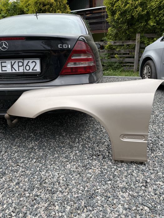 blotnik lewy mercedes w203 rok2004