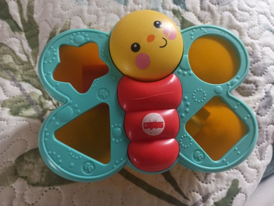 Motylek Fisher Price dopasowanie kształtów