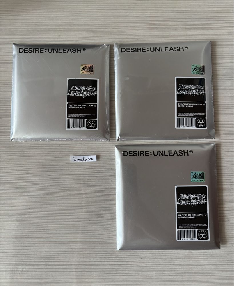 Продаж нових запакованих альбомів enhypen