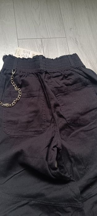 Spodnie z łańcuszkiem nowe 158