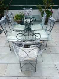 Mesa vidro biselado com 6 cadeiras em ferro fundido