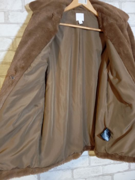 Кожушок зі штучного хутра колір кава з молоком. 46-48