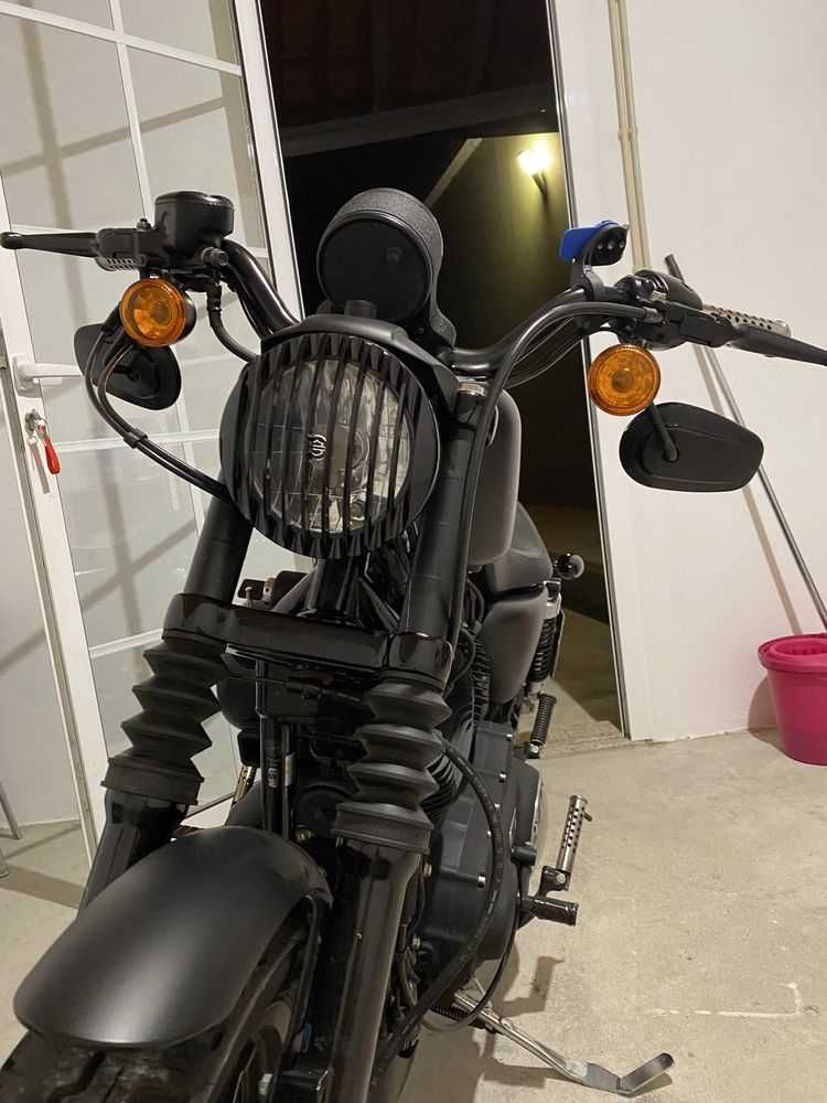 Grelha de proteção para farol Harley