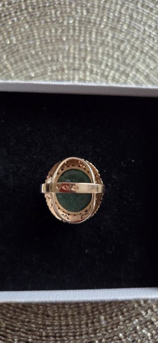 Pierścionek złoty PRL zielone oczko
