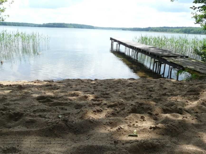 Domek na ogromnej działce z własną plażą i pomostem