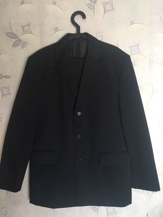 Костюм размер 50-52 состояние нового