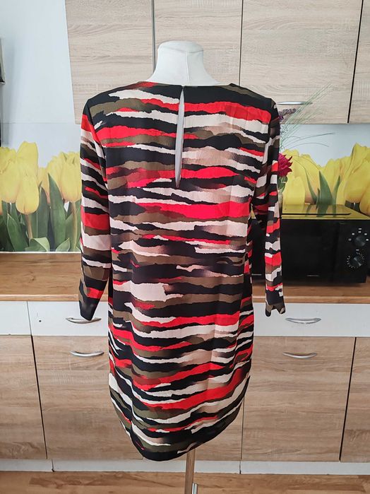 Śliczna koktajlowa mini sukienka H&M rozmiar 44 poliester/elastan