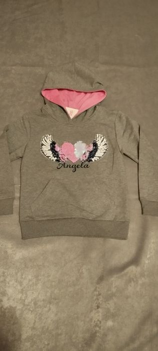 Bluza kapturek dziewczęca rozm 110/116 
Kolor szary posiada kap