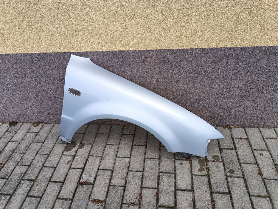 Błotnik prawy przód LB7Z org. Volkswagen Passat B5 części