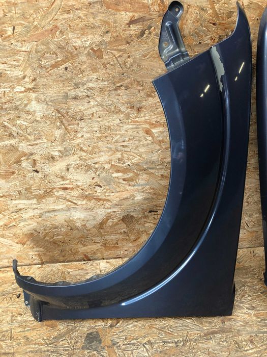 Błotnik przedni lewy prawy Pathfinder/Navara lift kolor b25