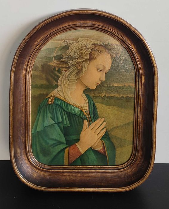 Quadro religioso com moldura dourada