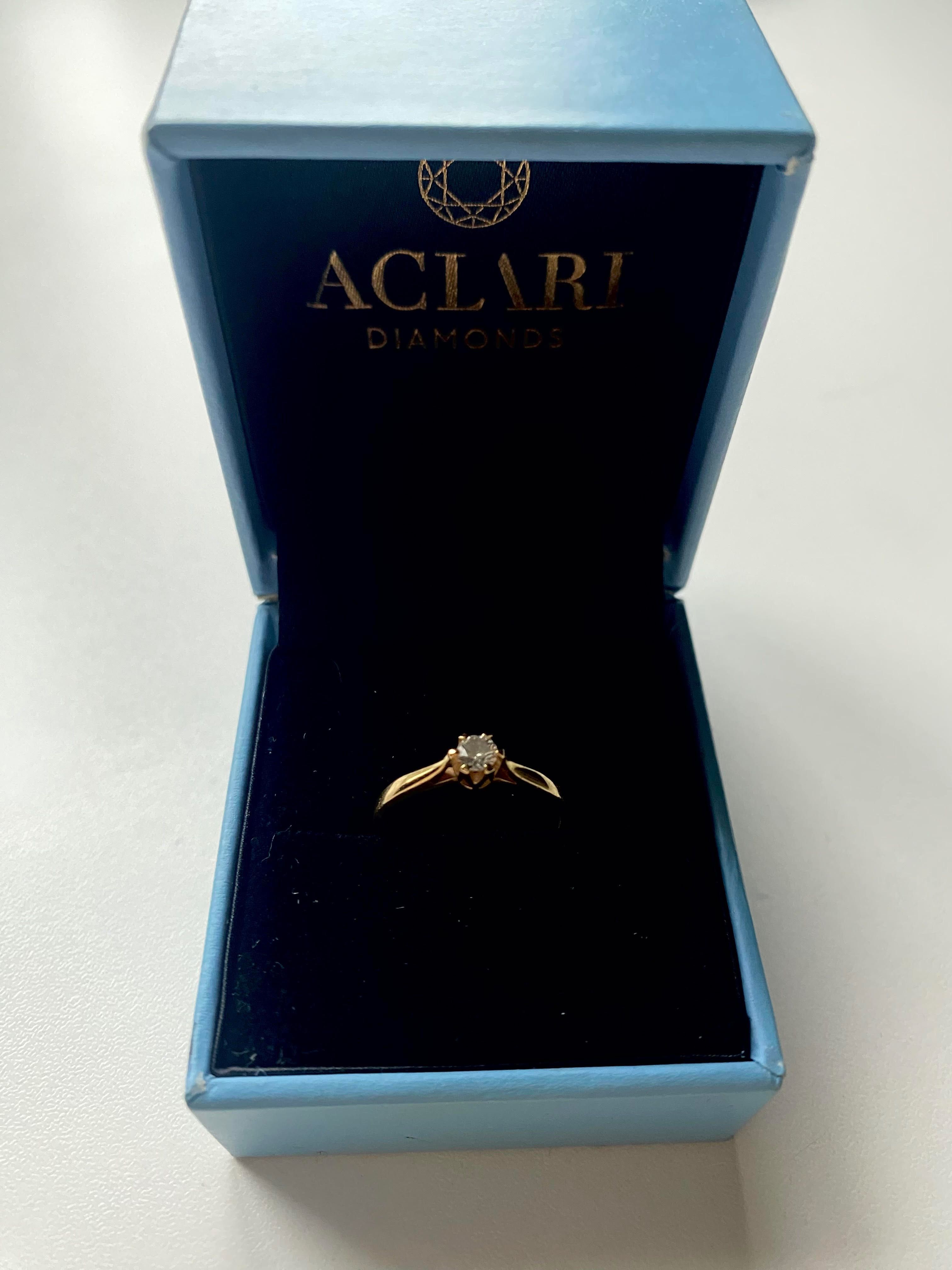 Złoty pierścionek zaręczynowy Aclari r. 9 brylant
