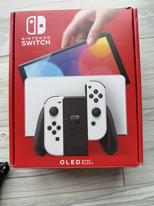 Nintendo Switch OLED plus 6 gier