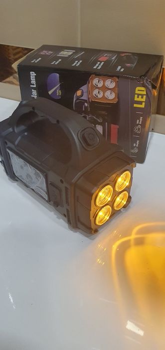 Современный многофункциональный фонарь с солнечной панелью .