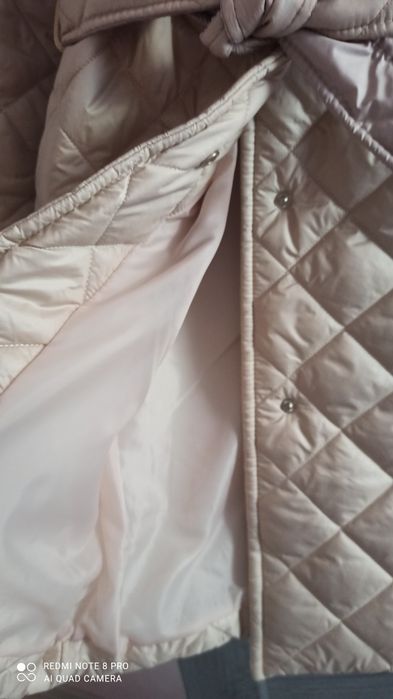 Жіноче стьобане пальто курточка з поясом