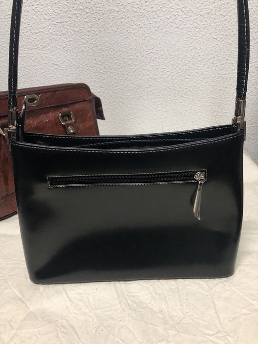 Vendo duas carteiras ,uma castanha outra preta