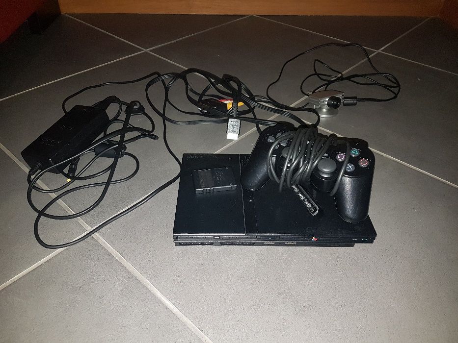 Vendo PlayStation 2 + 11 jogos + webcam toy