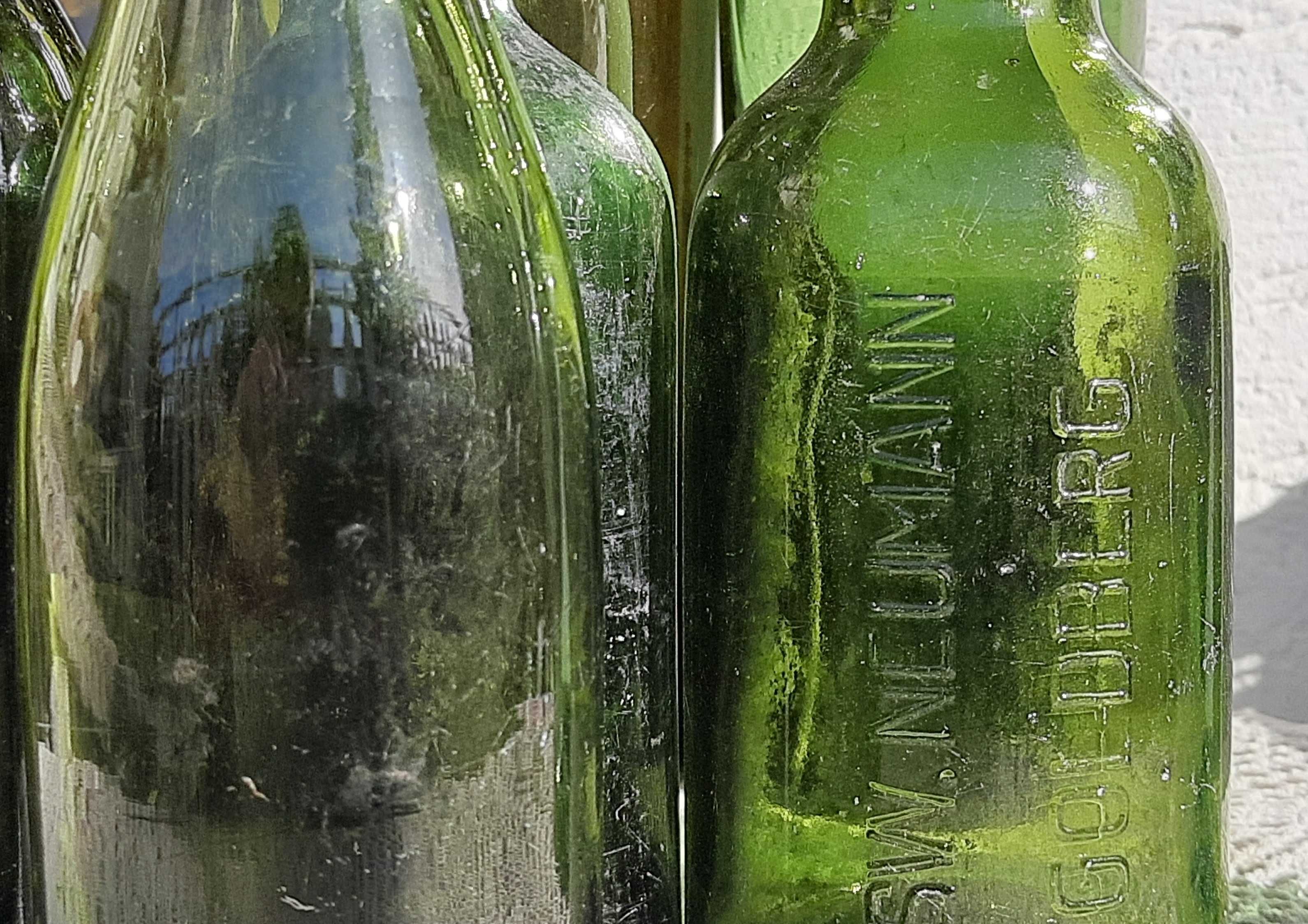 Sprzedam komplet starych zielonych butelek