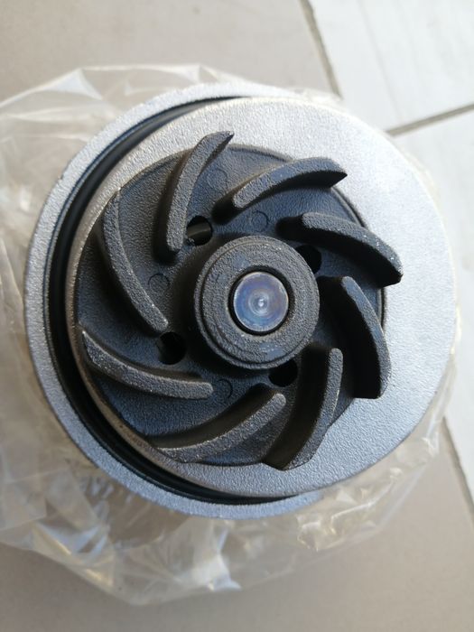 Помпа шевроле лачети 1.8