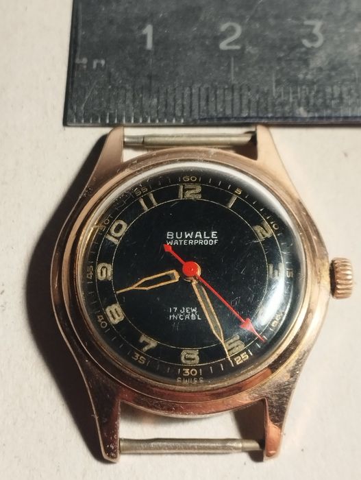 Швейцарские позолоченные часы.