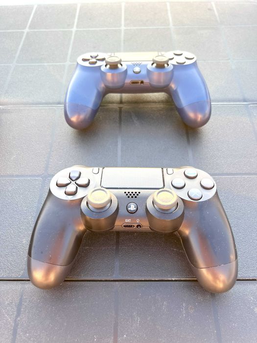 PlayStation 4 Slim 1Tb + 2 comandos + dock + PSN com + 10 jogos pagos