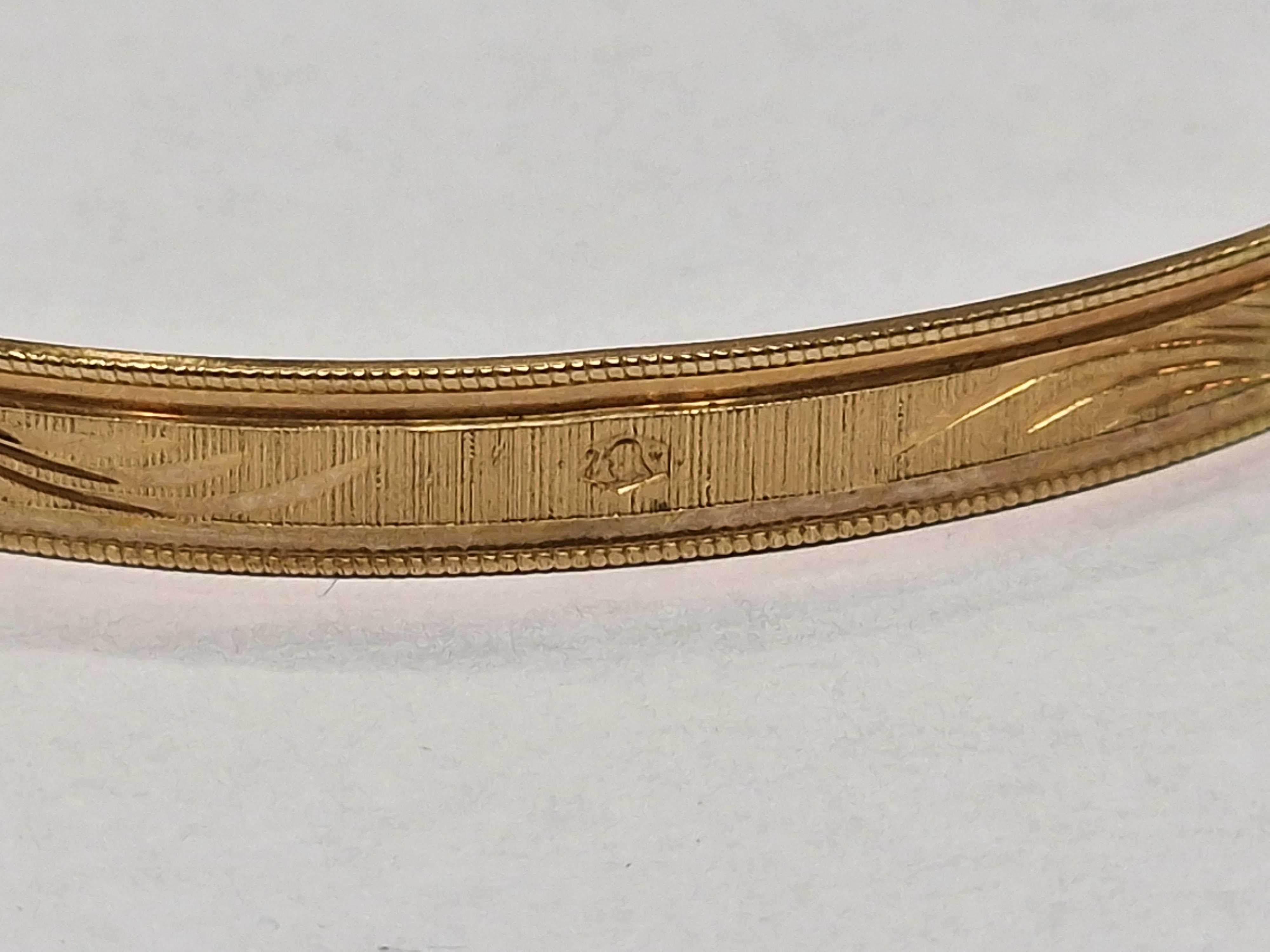 Złota bransoletka damska/ Sztywna/ Owalna/ 750/ 11.96 gram/ 1963-86