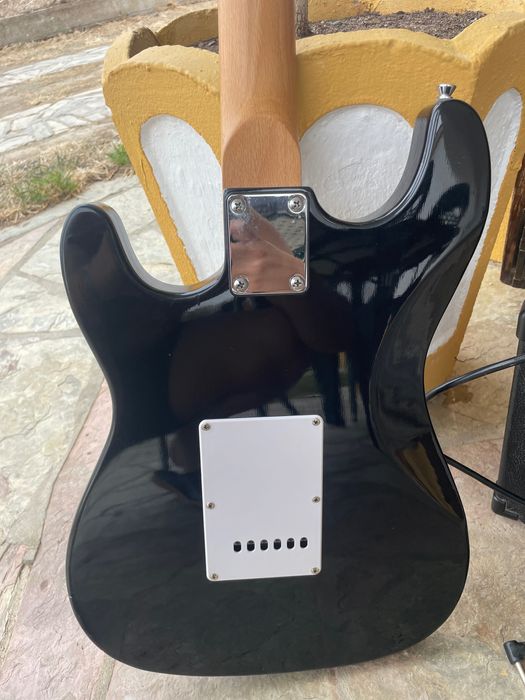 Guitarra elétrica lowcoast em estado novo com bolsa