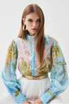 Блакитна блуза з квітами Karen Millen