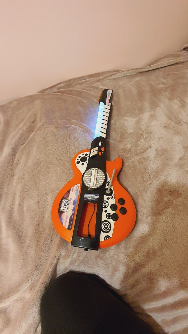 Gitara z bitami i podświetleniemSimba