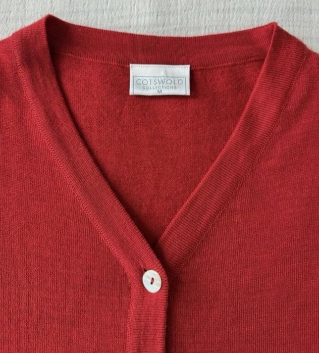 Подовжений светр на гудзиках з вовни мериноса