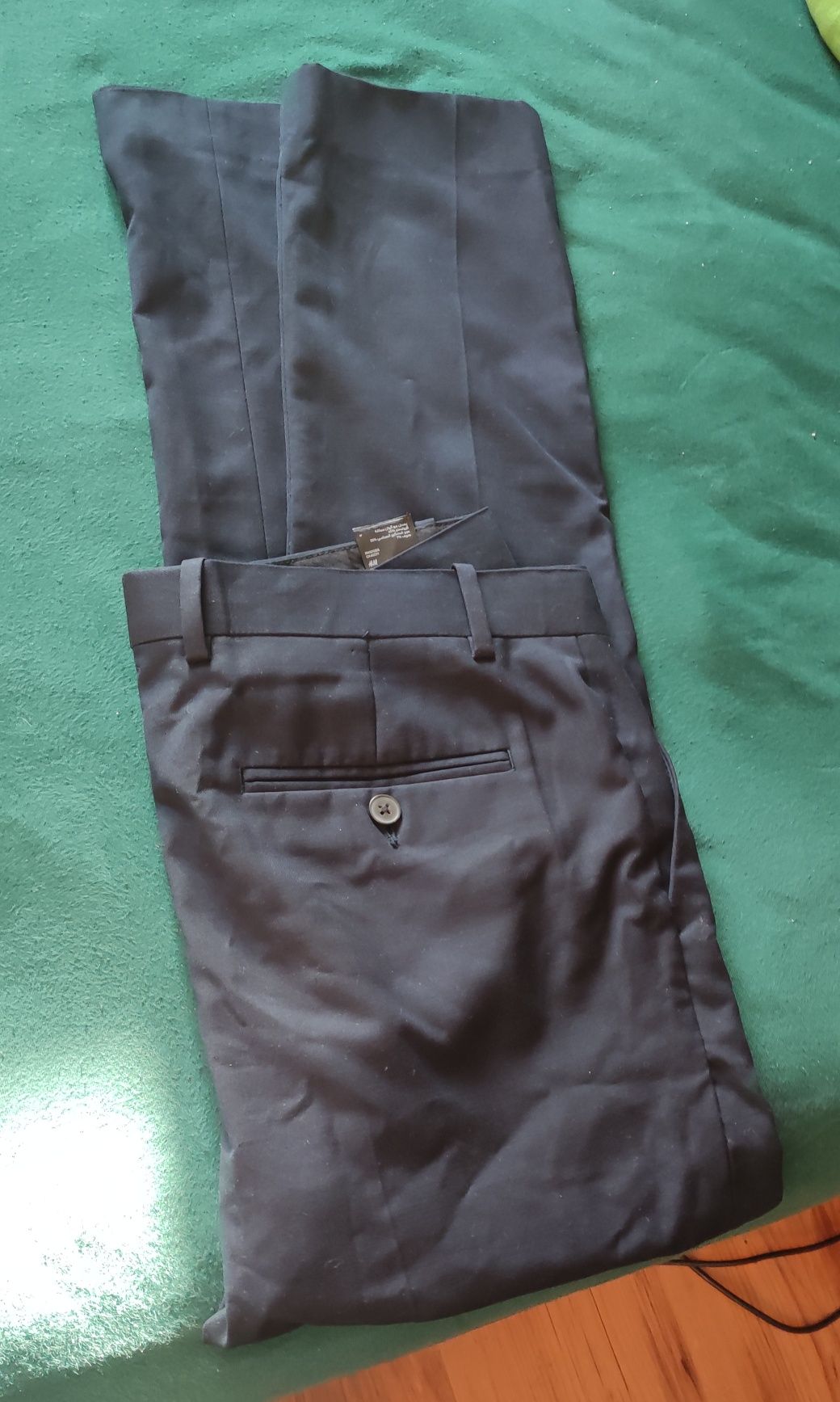 Nowe bez metki H&M r48 Eleganckie spodnie męskie materiałowe .
