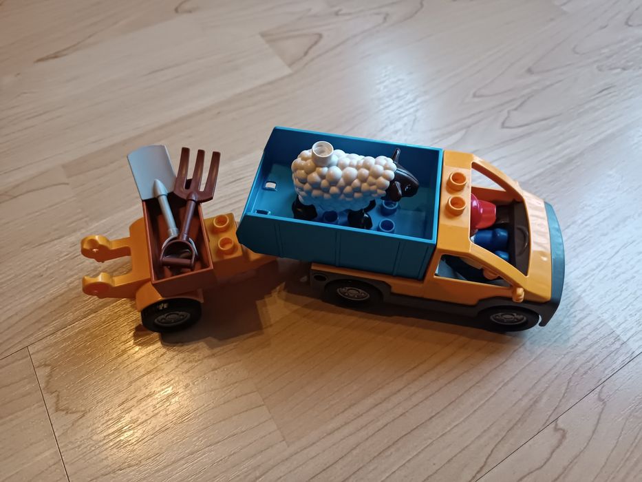 Klocki LEGO duplo zestaw auto przyczepa ludzik zwierzątko