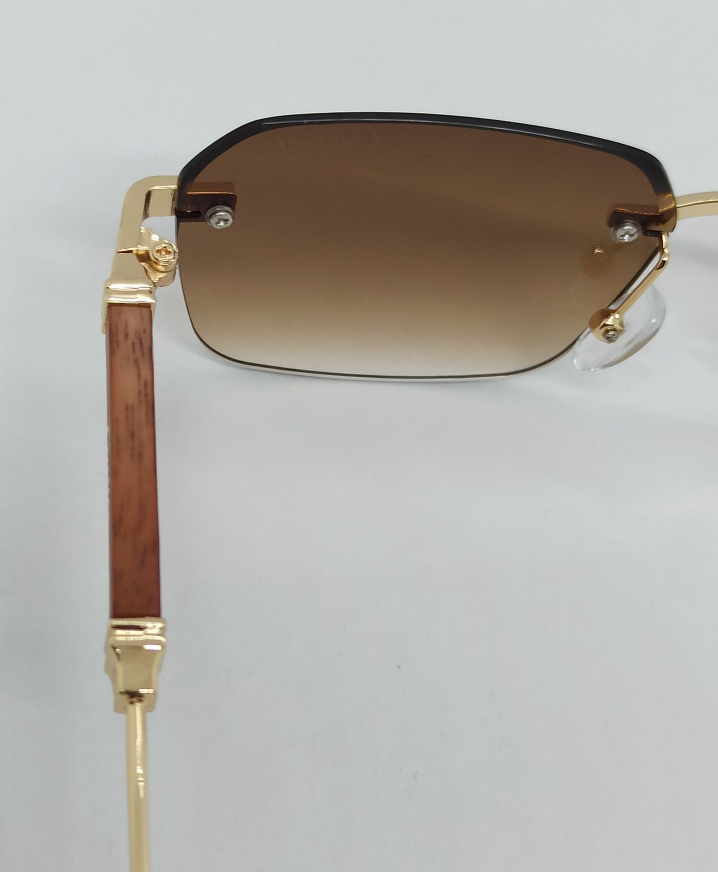 Cartier очки унисекс безоправные коричневый градиент дужки коричневые