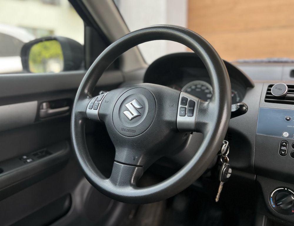 Suzuki Swift 1.3 2008r, klimatyzacja, podgrzewane fotele, el. lusterka