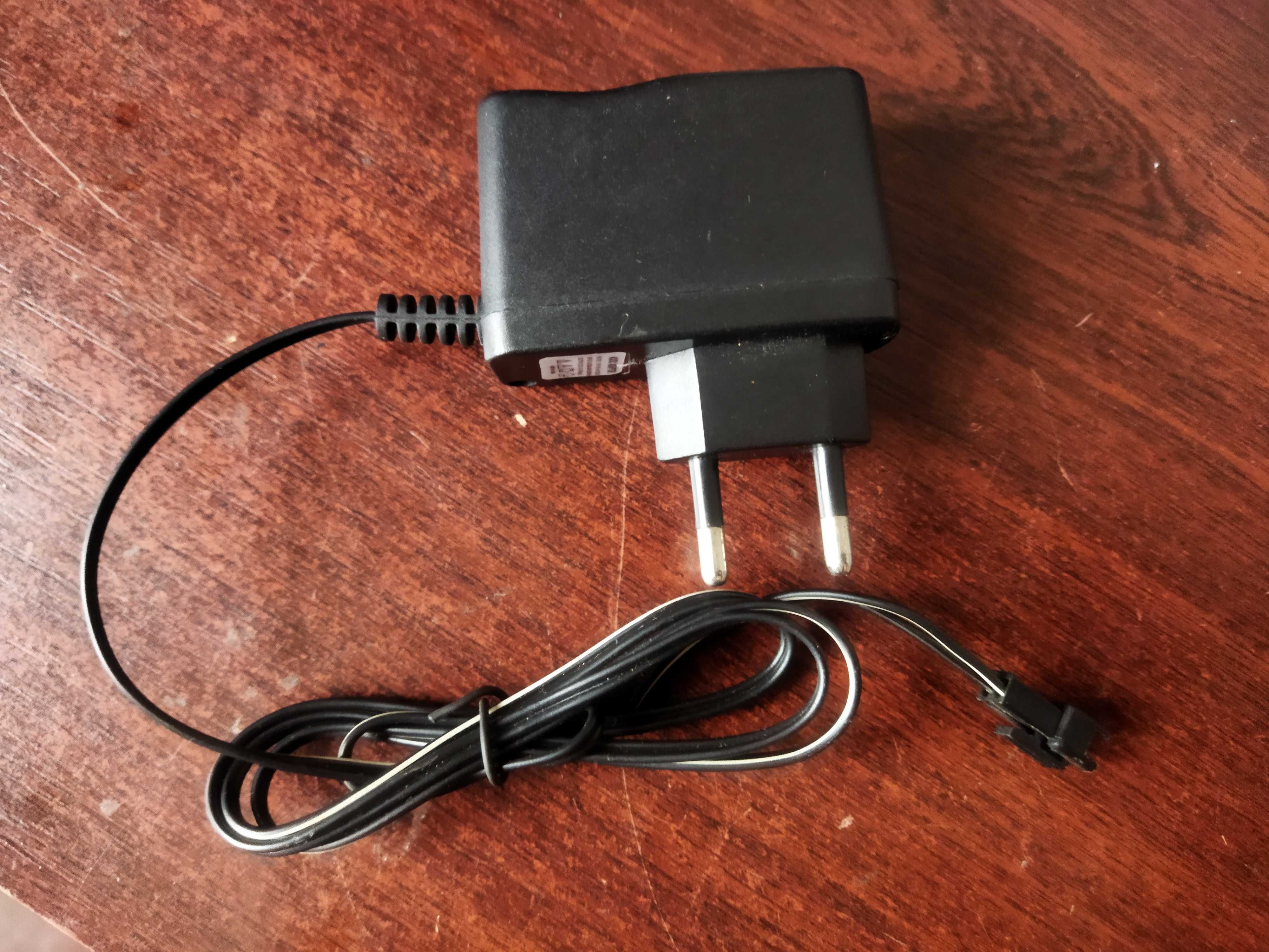 Зарядное устройство AC\DC Adapter 4V 0.2Ah аккумулятора игрушки.