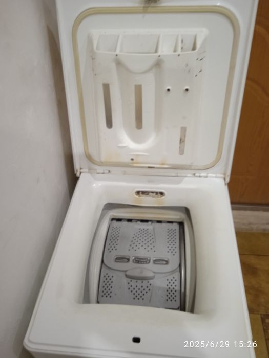 Продам стиральную машину вертикальной загрузки.