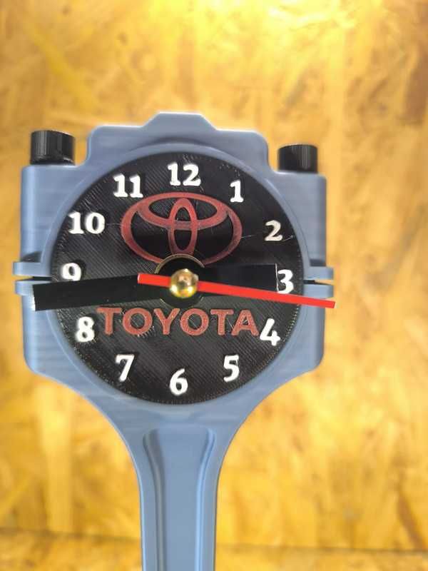 Relógio de mesa decorativo Toyota – formato pistão