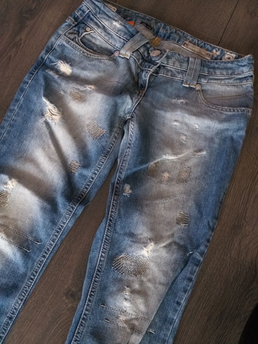 Spodnie River Island jeansy dżinsy przecierane dziury rozdarcia r.  S