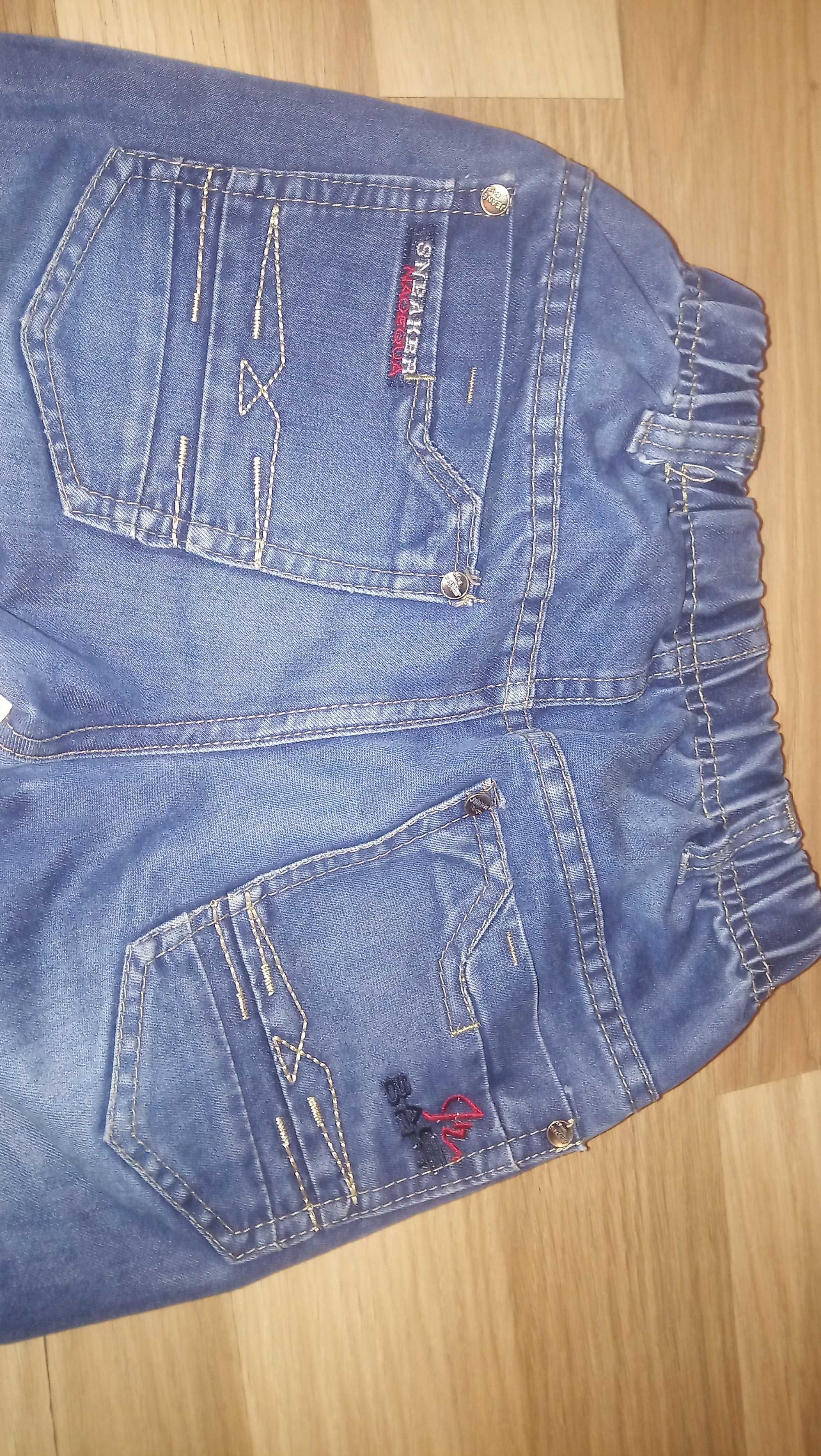 Spodnie jeans 134