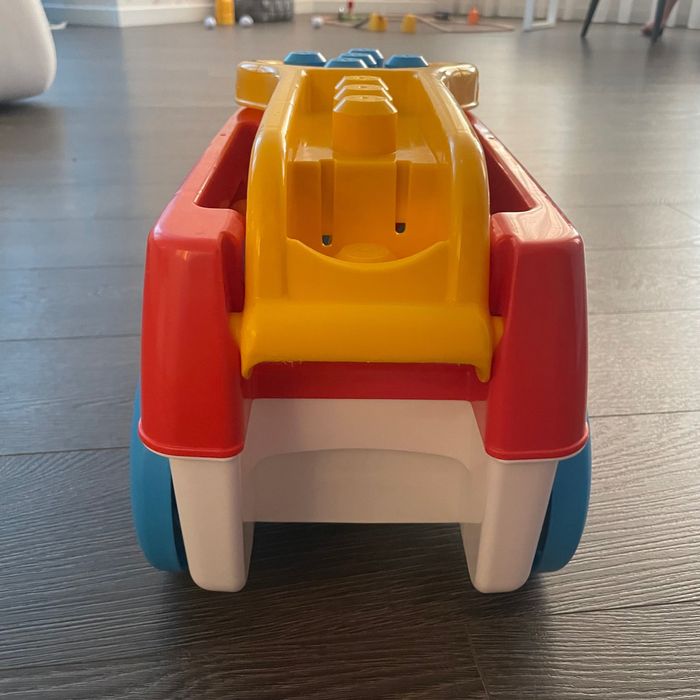 Розвиваюча каталка - конструктор battat