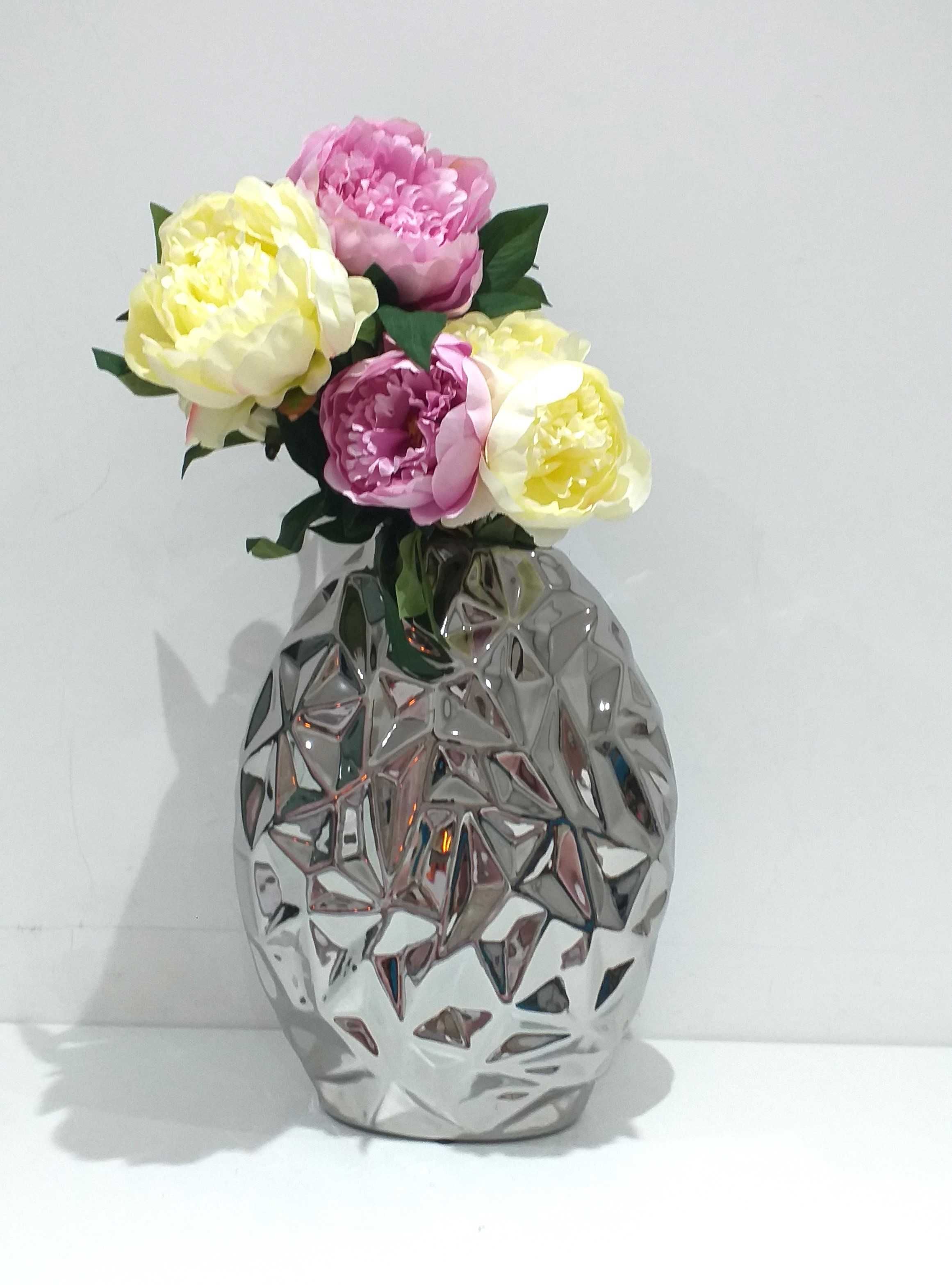 Peças decorativas em prateado  de grandes dimensões