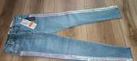Spodnie 128 nowe jeansowe dziewczęce z cekinami Reserved