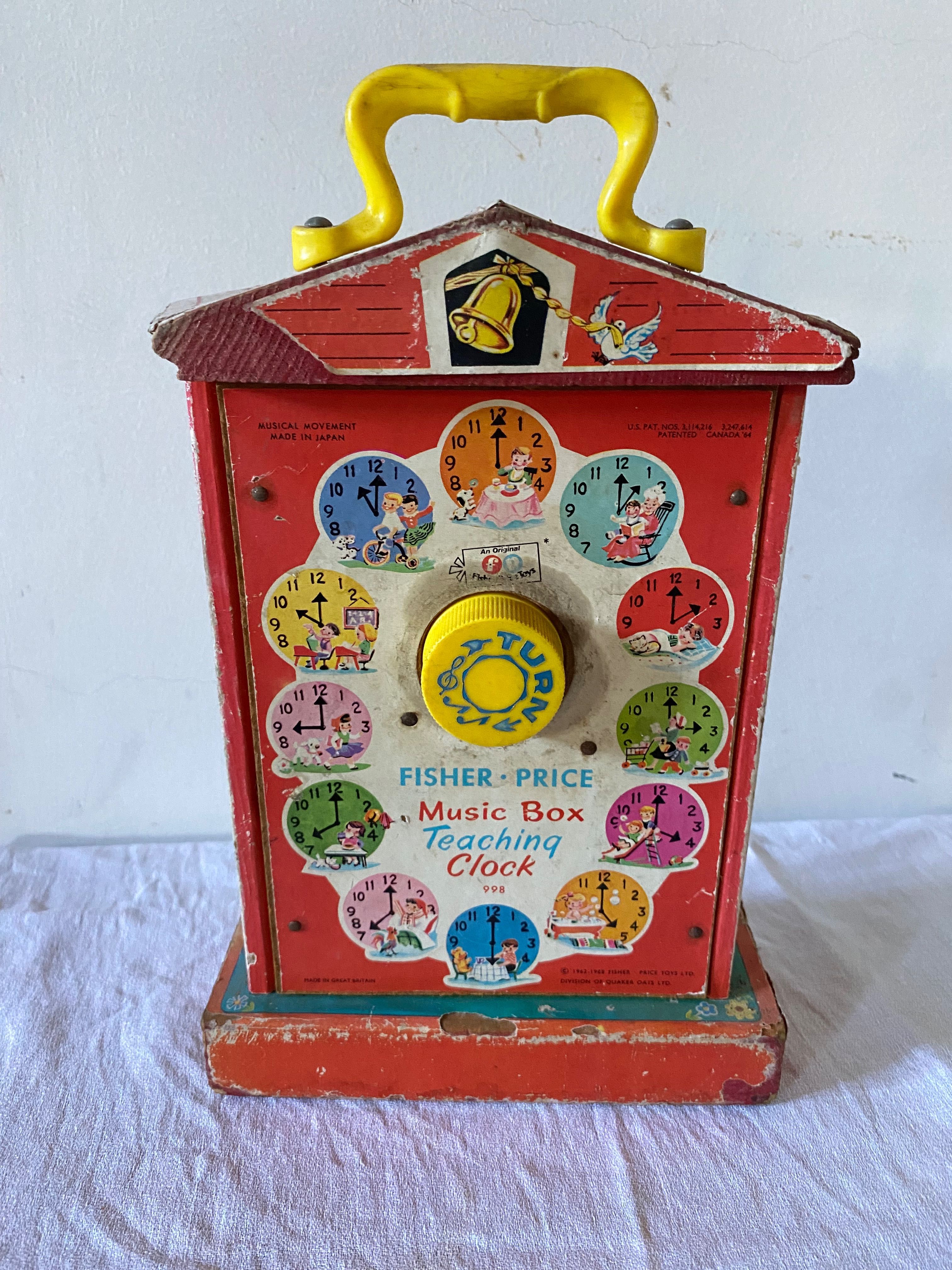 Brinquedo relógio caixa de musica