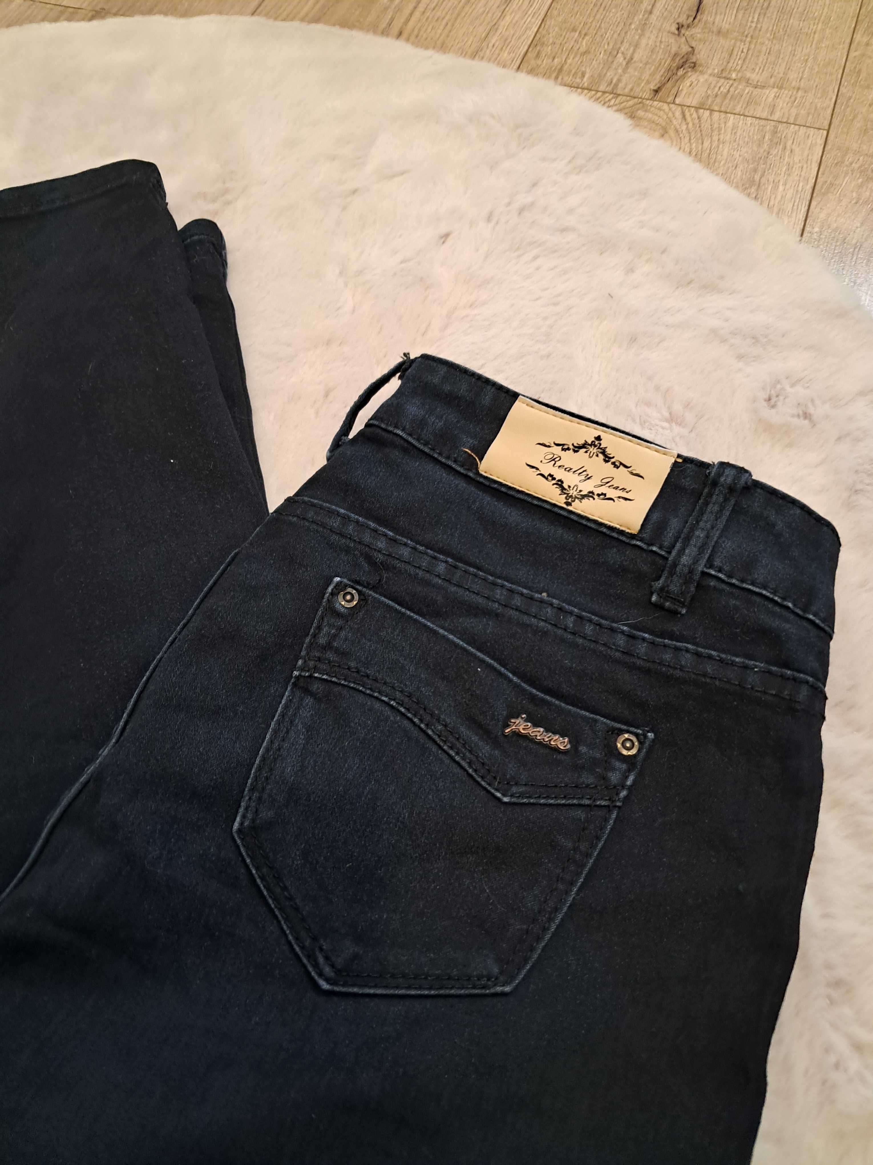 Czarne przetarte jeansy dżinsy jeans spodnie jeansowe z dziurami