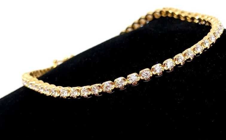 Złota bransoletka tenisówka z diamentami 1,18ct Pr.585 W:5,14gr 18cm