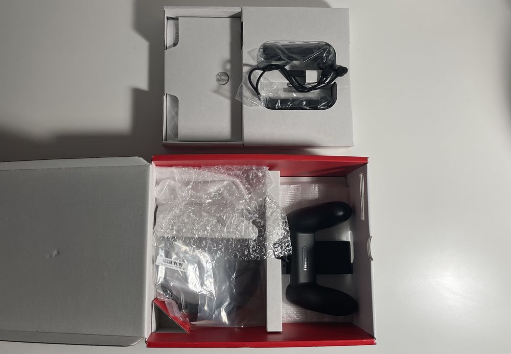 Nintendo Switch V2 + Comando + 4 jogos
