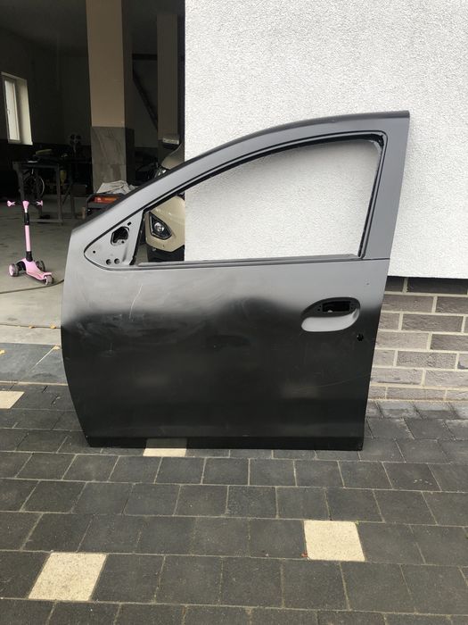 Двері нові оригінал до Renault Dacia Duster 2