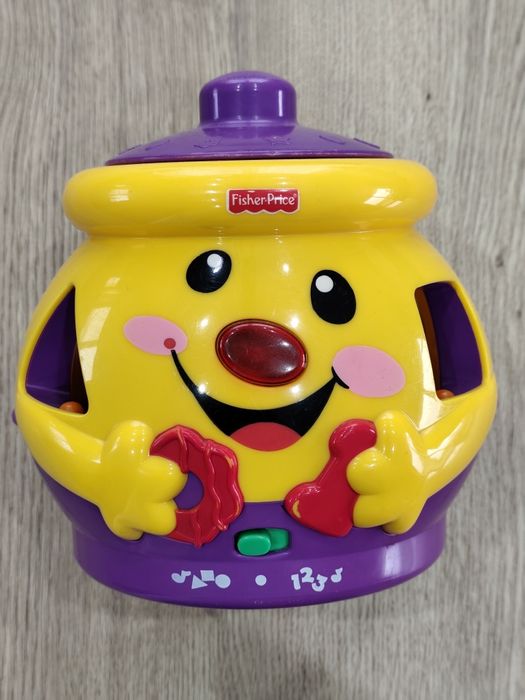 Garnuszek Fischer Price