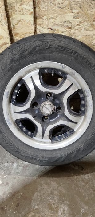 Диск R13 4x100 з гумою